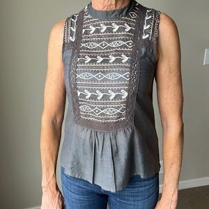 From Anthropology their “tiny” brand sleeveless top with embroidered front